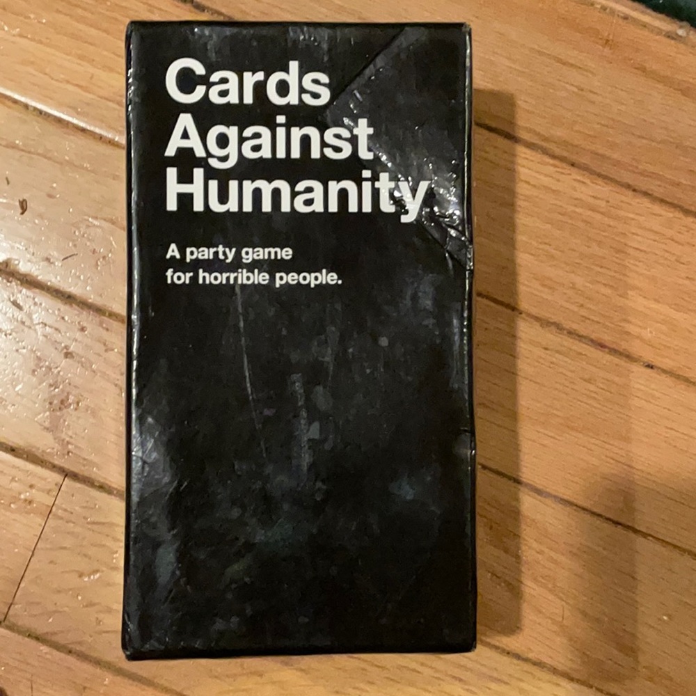 Cards Against Humanity Adult Card Game. Age 17 and over.